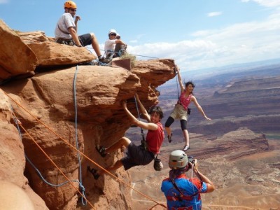 Climbers free soloing over Dead Horse Point, yeehaw!